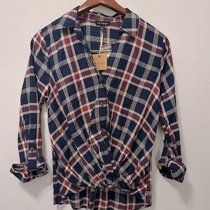 Plaid collared asymmetrical top with blue and red plaid design. NWT